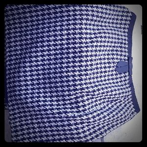 Knee length black an white skirt